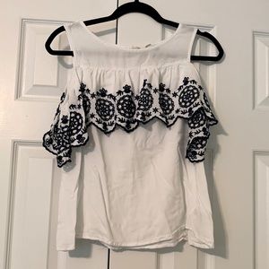 cold shoulder top with blue embroidery